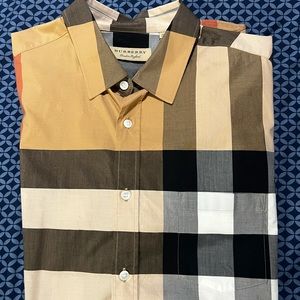 Hi I’m selling a Burberry men’s button down short sleeve shirt .